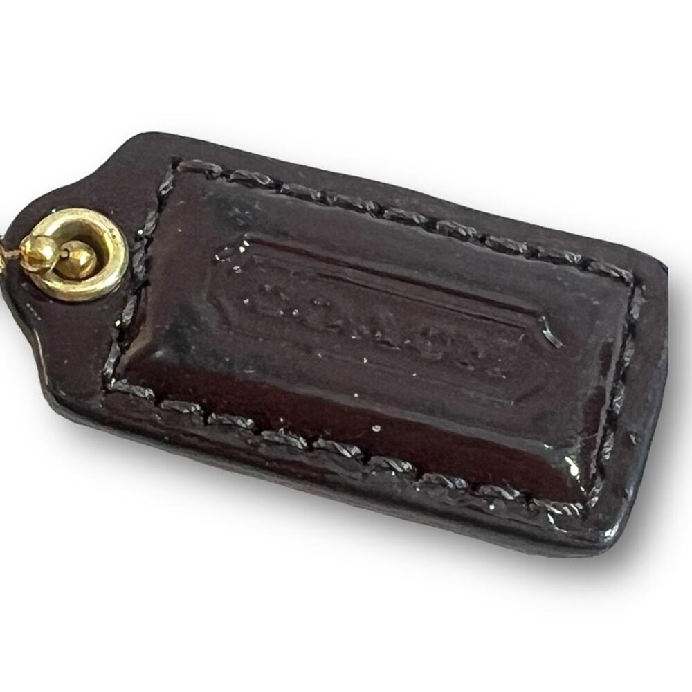 COACH WRISTLET in brown leather with Gold Tone hardware and COACH LOGO TAG - Picture 15 of 16